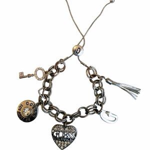 GUESS Silver Tone Heart Charm Bolo Bracelet with Rhinestones